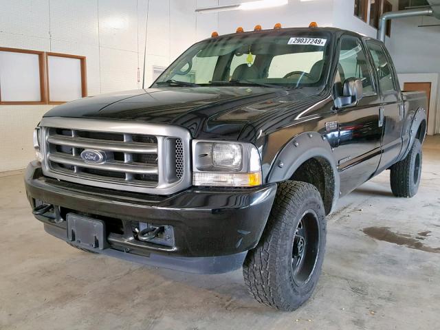 1FTSW31F62EA49219 - 2002 FORD F350 SRW S BLACK photo 2