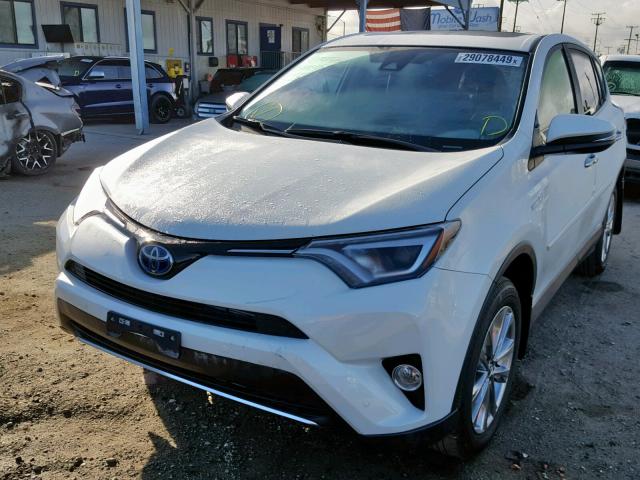 JTMDJREV0JD197768 - 2018 TOYOTA RAV4 HV LI WHITE photo 2