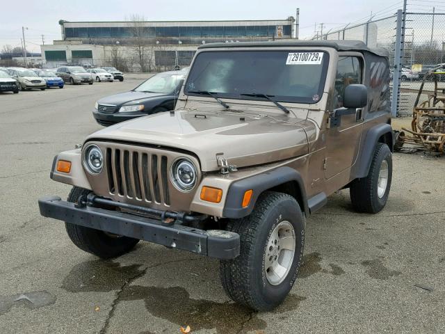 1J4FA29194P736697 - 2004 JEEP WRANGLER / TAN photo 2