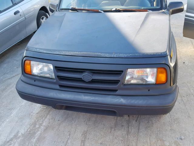 2S3TC02C4T6409577 - 1996 SUZUKI SIDEKICK J BLACK photo 7