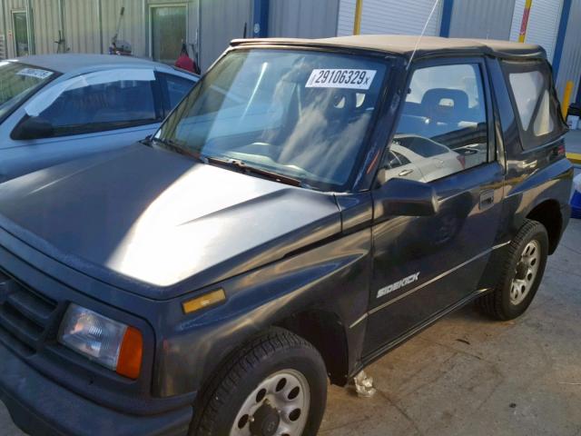 2S3TC02C4T6409577 - 1996 SUZUKI SIDEKICK J BLACK photo 9