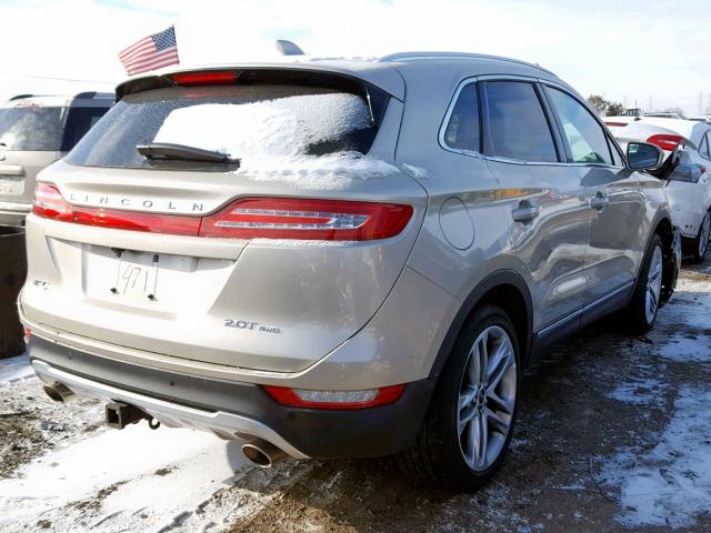 5LMCJ3D99HUL50471 - 2017 LINCOLN MKC RESERV GOLD photo 4