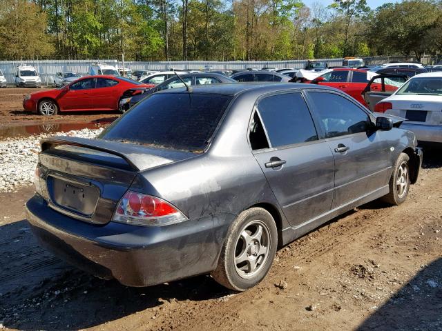 JA3AJ86E84U030945 - 2004 MITSUBISHI LANCER OZ BLACK photo 4