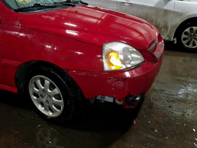 KNADC125936268616 - 2003 KIA RIO RED photo 9