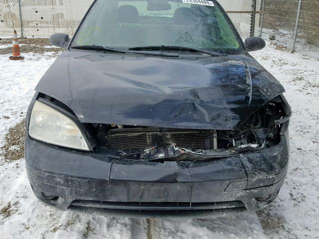 1FAHP34NX6W209277 - 2006 FORD FOCUS ZX4 BLACK photo 9