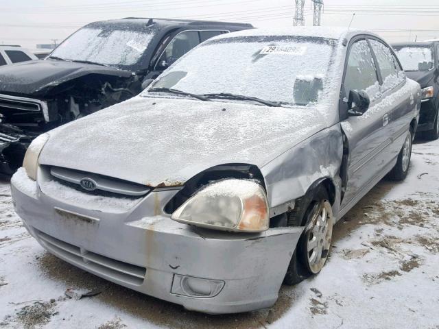 KNADC125146301920 - 2004 KIA RIO SILVER photo 2