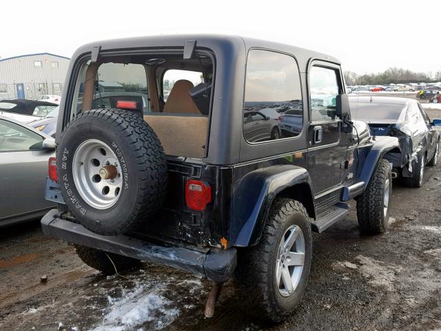 1J4FA59S32P717666 - 2002 JEEP WRANGLER / BLACK photo 4