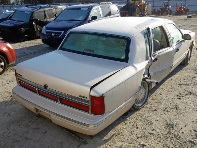 1LNLM83W1VY662044 - 1997 LINCOLN TOWN CAR C WHITE photo 4