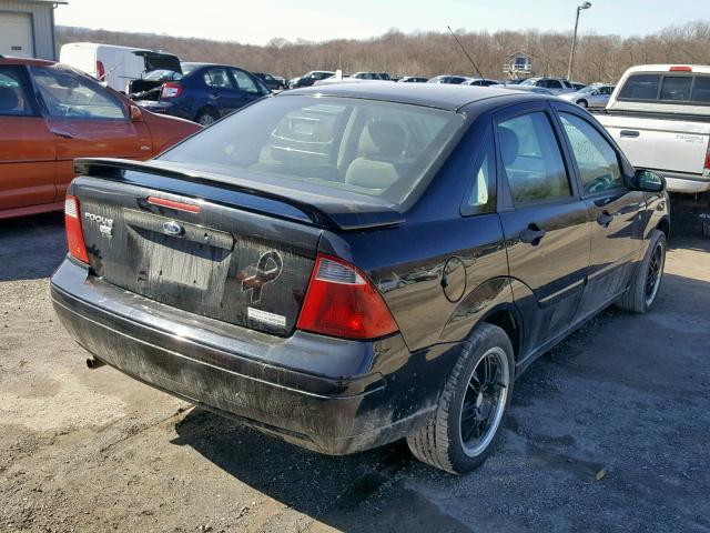 1FAHP34N97W351802 - 2007 FORD FOCUS ZX4 BLACK photo 4