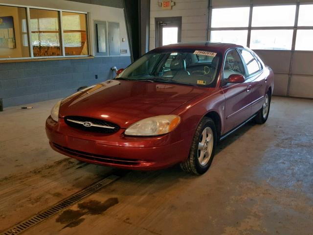 1FAFP55S6YA226035 - 2000 FORD TAURUS SES RED photo 2