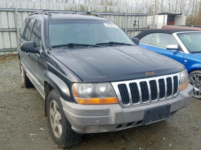 1J4GW48S1YC354284 - 2000 JEEP GRAND CHER BLACK photo 1