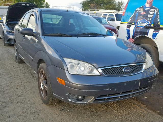 1FAHP34N67W353555 - 2007 FORD FOCUS ZX4 GRAY photo 1