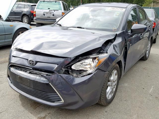 3MYDLBZV3GY125143 - 2016 TOYOTA SCION IA GRAY photo 2