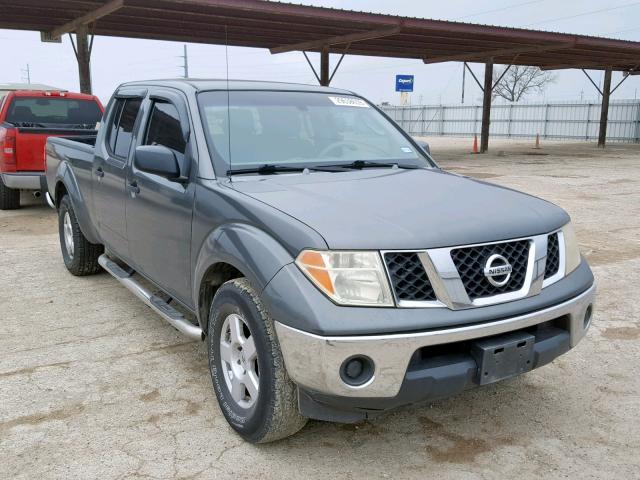 1N6AD09U97C417735 - 2007 NISSAN FRONTIER C GRAY photo 1