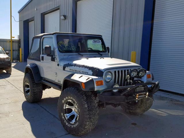 1J4FA69S74P768693 - 2004 JEEP WRANGLER / SILVER photo 1