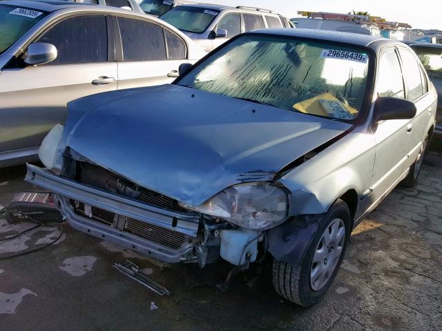 2HGEJ6615YH558795 - 2000 HONDA CIVIC BASE TEAL photo 2