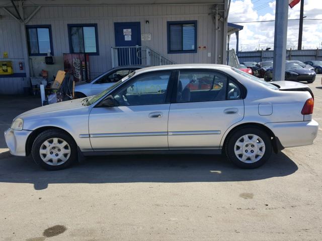 2HGEJ6613XH528452 - 1999 HONDA CIVIC BASE SILVER photo 9