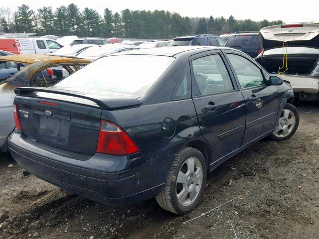 1FAHP34N57W350727 - 2007 FORD FOCUS ZX4 BLACK photo 4