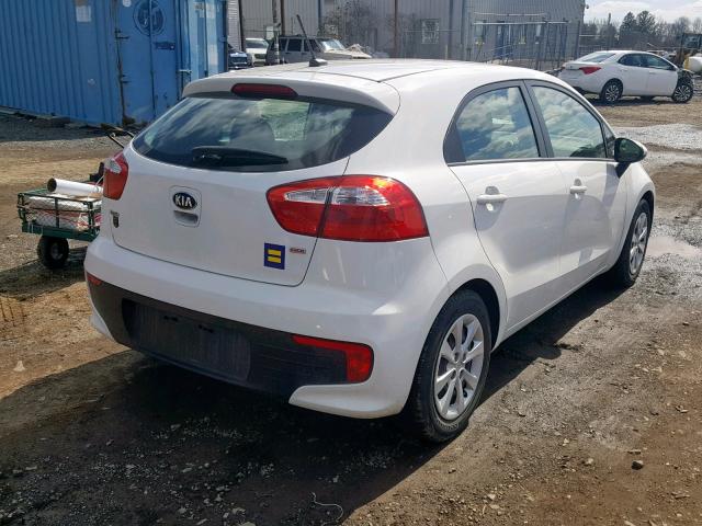 KNADM5A39G6659940 - 2016 KIA RIO LX WHITE photo 4