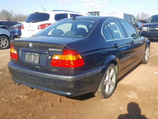 WBAEW53435PN37909 - 2005 BMW 330 XI BLACK photo 4