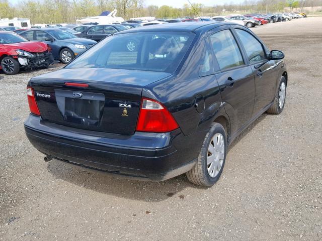 1FAFP34N36W141931 - 2006 FORD FOCUS ZX4 BLACK photo 4