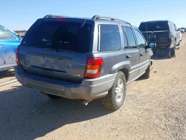 1J4GW48N42C241821 - 2002 JEEP GRAND CHER BLUE photo 4