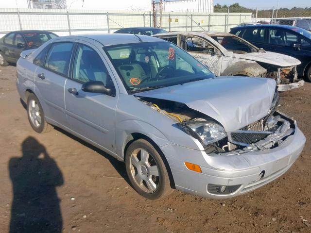 1FAHP34NX7W118057 - 2007 FORD FOCUS ZX4 SILVER photo 1