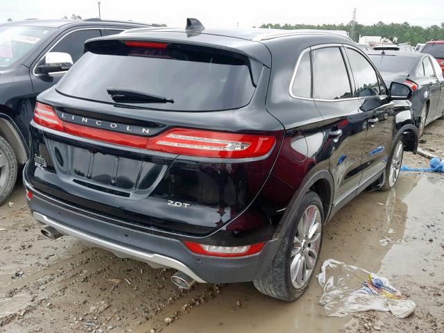 5LMCJ3C90HUL14878 - 2017 LINCOLN MKC RESERV BLACK photo 4