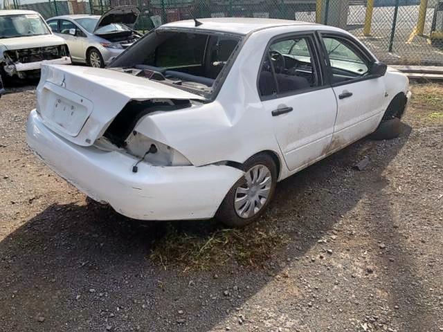 JA3AJ26E76U070630 - 2006 MITSUBISHI LANCER ES WHITE photo 4