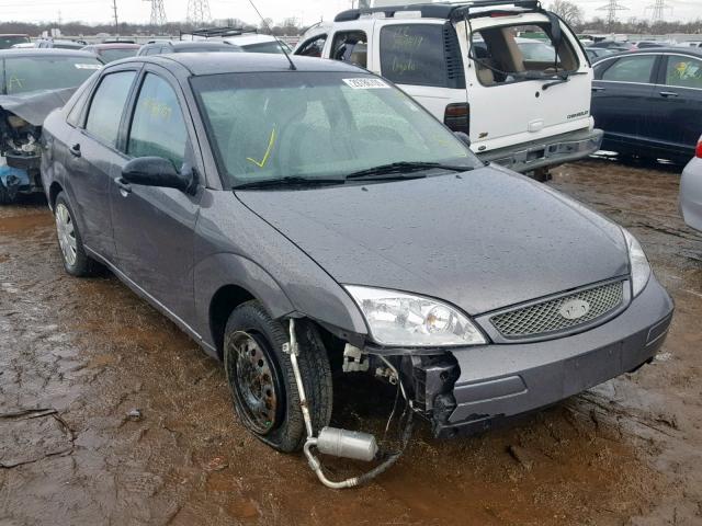 1FAFP34N05W101255 - 2005 FORD FOCUS ZX4 GRAY photo 1