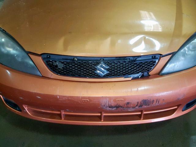 KL5JD66Z95K169341 - 2005 SUZUKI RENO S ORANGE photo 9