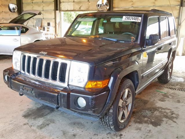 1J8HH48K27C699710 - 2007 JEEP COMMANDER BLACK photo 2