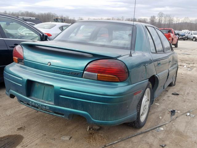 1G2NW52TXWC779301 - 1998 PONTIAC GRAND AM G GREEN photo 4