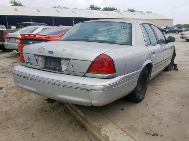 2FAFP73W1XX130269 - 1999 FORD CROWN VICT GRAY photo 4