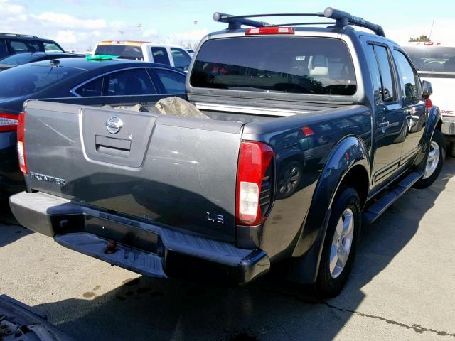 1N6AD07U46C423637 - 2006 NISSAN FRONTIER C GRAY photo 4