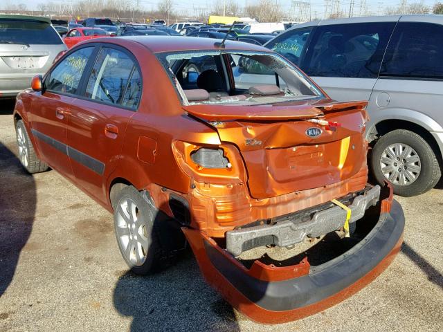 KNADE223996548656 - 2009 KIA RIO BASE ORANGE photo 3