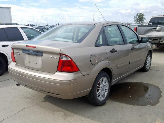 1FAFP34N65W224400 - 2005 FORD FOCUS ZX4 TAN photo 4