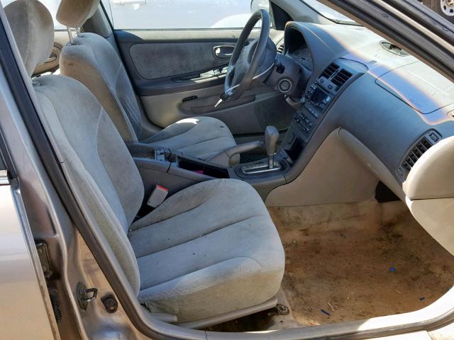 JN1CA31D01T800586 - 2001 NISSAN MAXIMA GXE GOLD photo 5