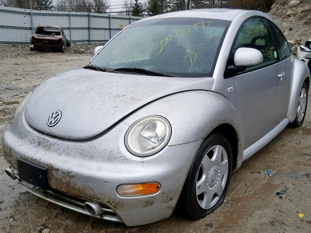 3VWCC21C0YM411123 - 2000 VOLKSWAGEN NEW BEETLE ნაცრისფერი ფოტო 2