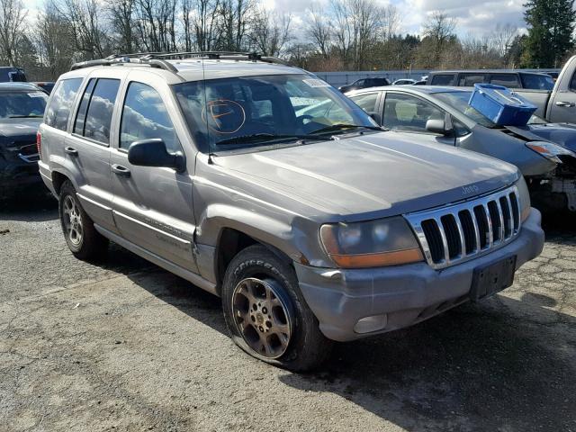 1J4GW58S1XC700130 - 1999 JEEP GRAND CHER SILVER photo 1