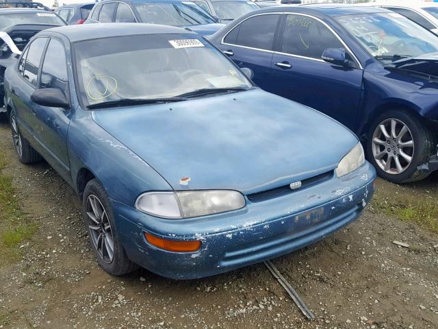 1Y1SK5262SZ035764 - 1995 GEO PRIZM BASE მწვანე ფოტო 1