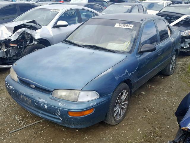 1Y1SK5262SZ035764 - 1995 GEO PRIZM BASE მწვანე ფოტო 2