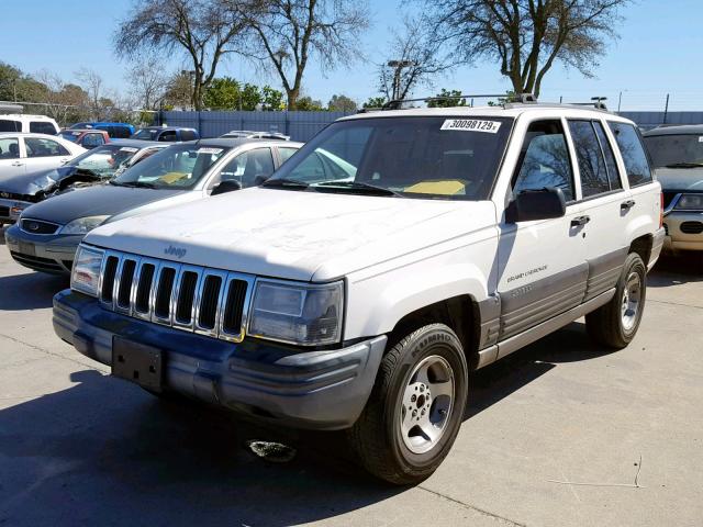 1J4GZ58Y9VC584412 - 1997 JEEP GRAND CHER WHITE photo 2