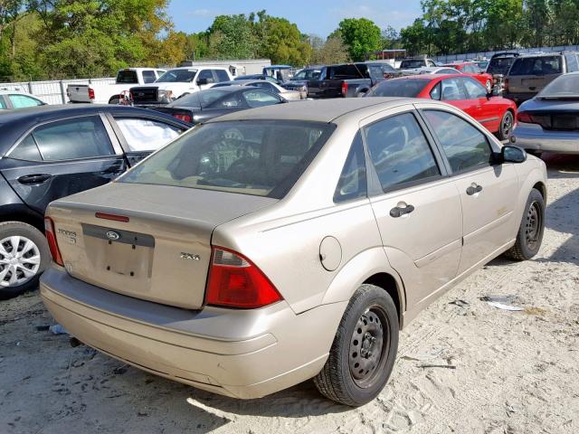 1FAFP34N66W105229 - 2006 FORD FOCUS ZX4 GOLD photo 4