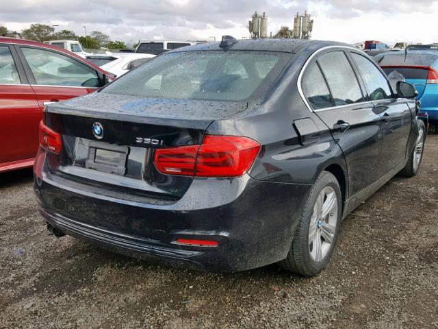 WBA8B9G57JNV11435 - 2018 BMW 330 I BLACK photo 4