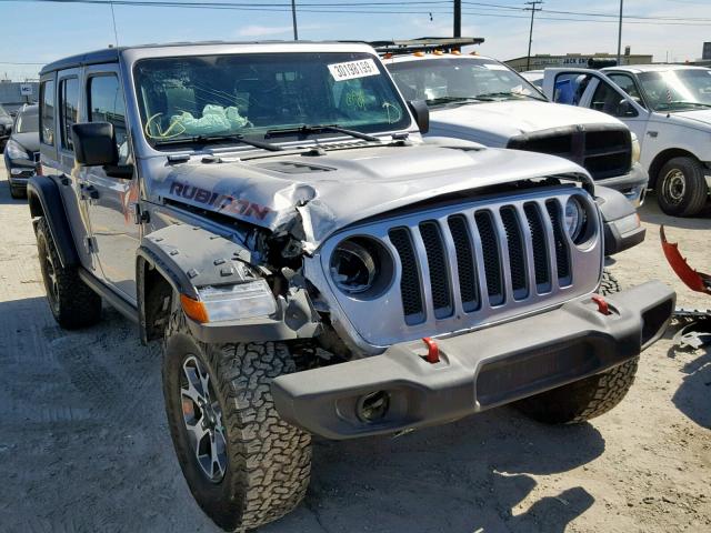 1C4HJXFG7JW127551 - 2018 JEEP WRANGLER U GRAY photo 1