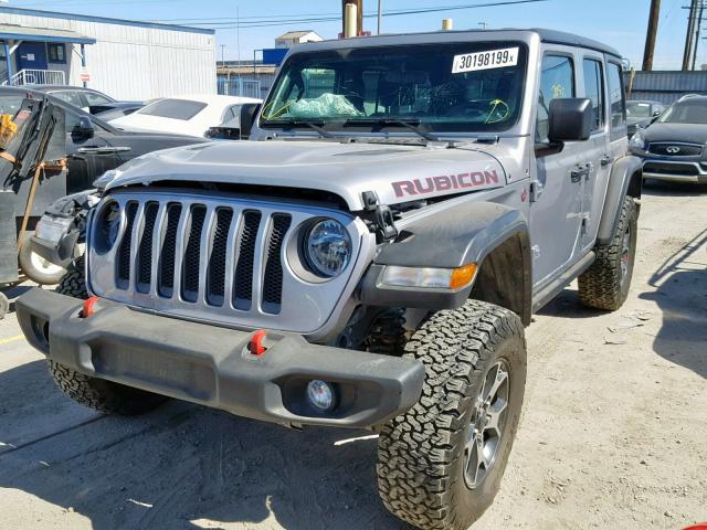 1C4HJXFG7JW127551 - 2018 JEEP WRANGLER U GRAY photo 2