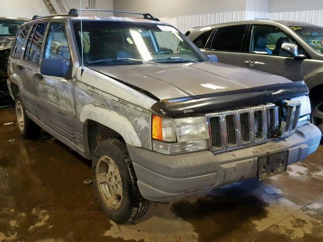 1J4GZ58S3VC616248 - 1997 JEEP GRAND CHER TAN photo 1