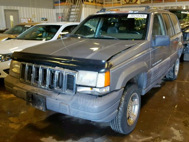 1J4GZ58S3VC616248 - 1997 JEEP GRAND CHER TAN photo 2