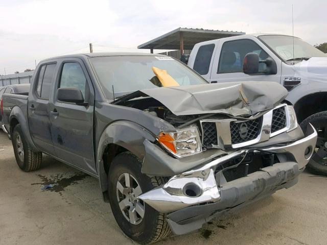 1N6AD07U85C410663 - 2005 NISSAN FRONTIER C SILVER photo 1